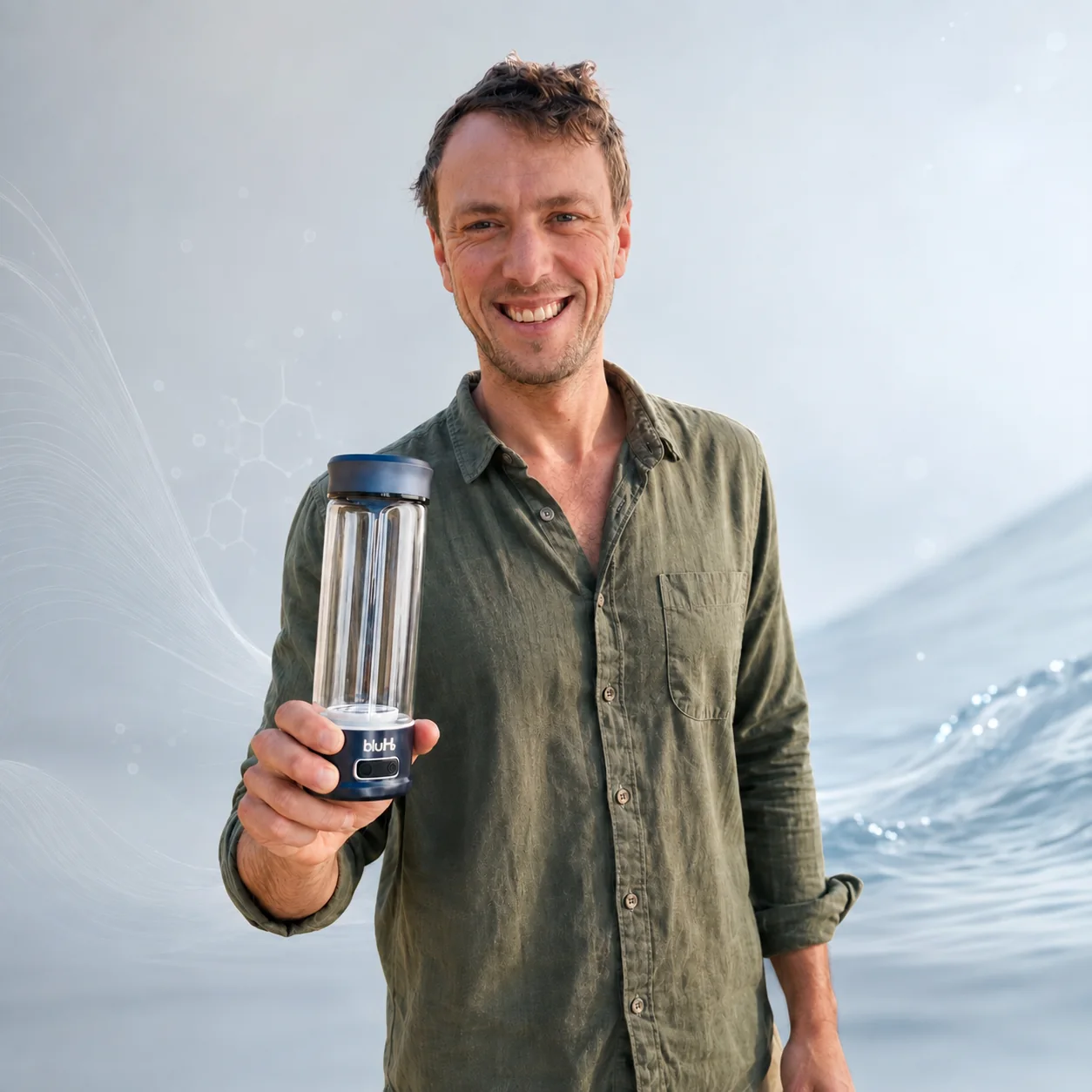 BluH2 founder holding the hydrogen water bottle