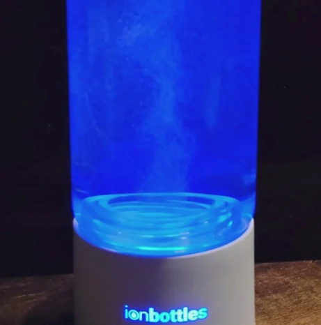 Close-up of hydrogen bubbles generating inside a hydrogen water bottle