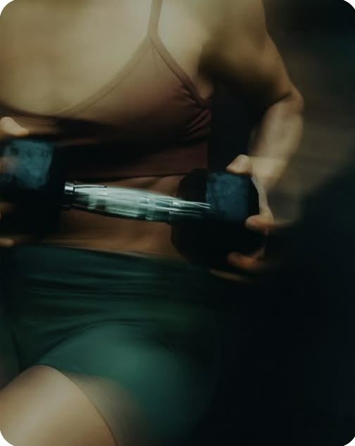 Athlete training with a dumbbell